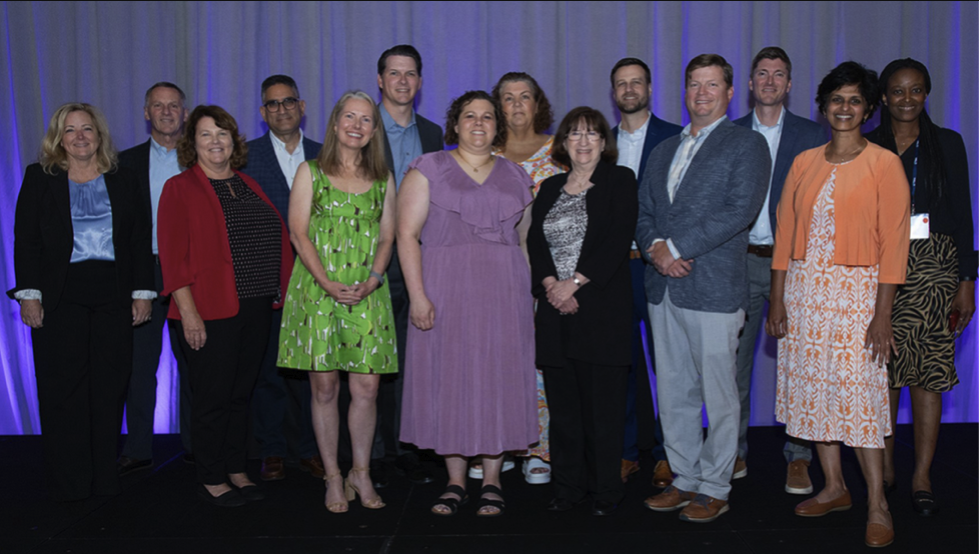 Winners of the 2023 Plan Sponsor of the Year awards program include JAX’s Malini Kizhatil, Benefits Program Manager, (second from right) and Adelia Soremekun, Senior Director, of Benefits, Health and Wellness (far right).